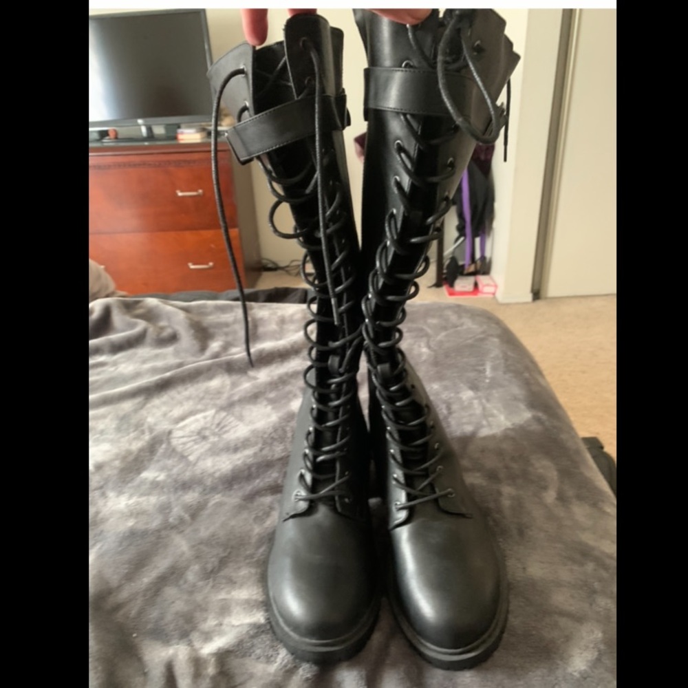 Never worn knee-high lace up combat boots
